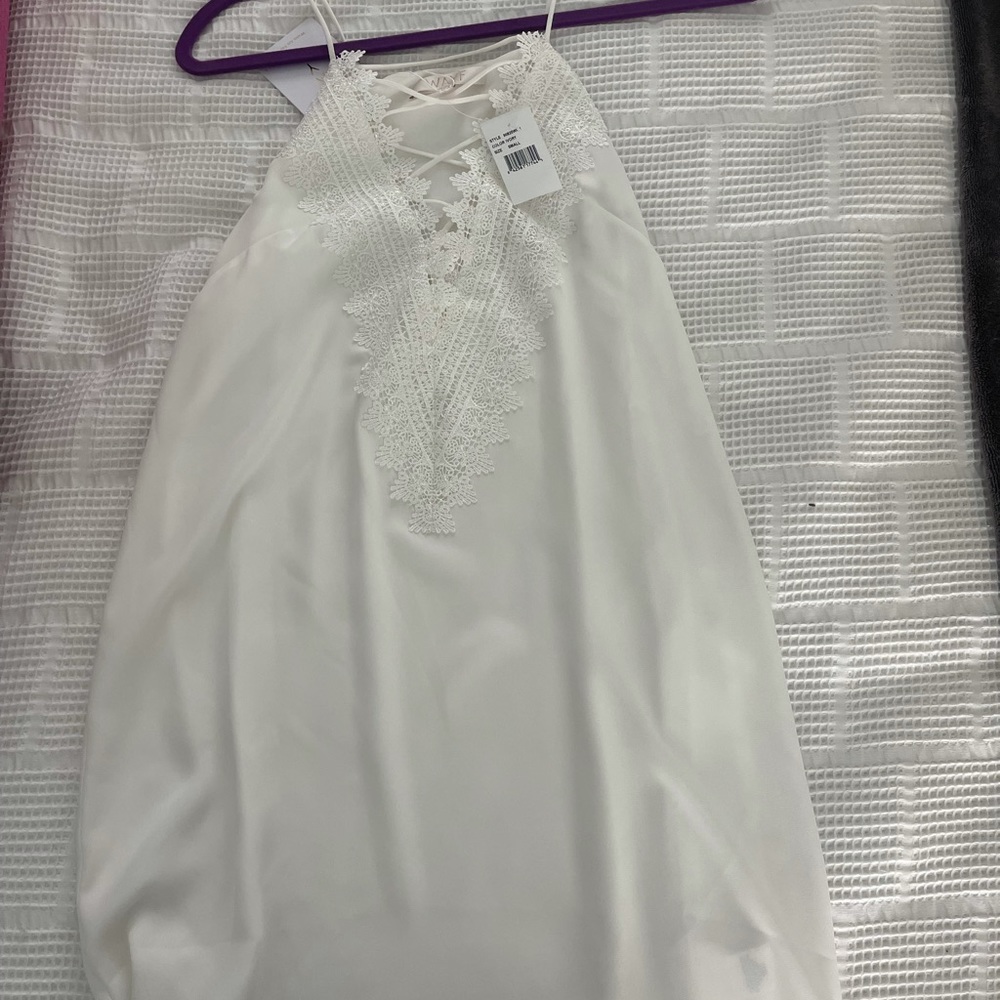 White cross front dress